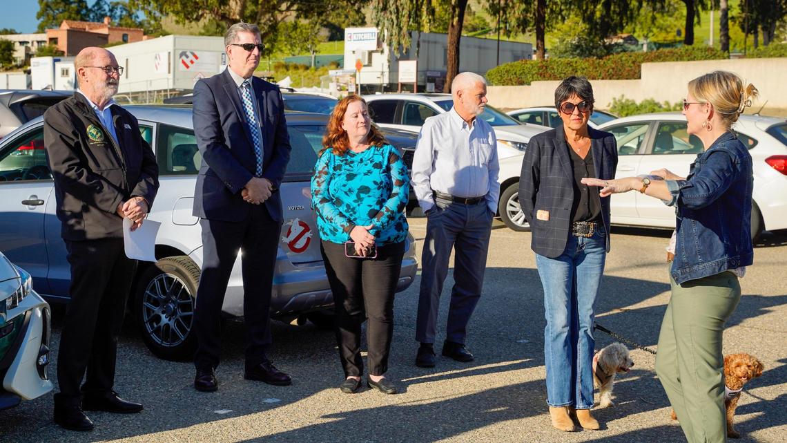 California state Sen. John Laird, left, and San Luis Obispo County Department of Social Services director Devin Drake, deputy director Linda Belch, District 2 Supervisor Bruce Gibson and District 3 Supervisor Dawn Ortiz-Legg listen to a presentation at the future location of the Welcome Home Village transitional housing project in San Luis Obispo on Thursday, Feb. 20, 2025.