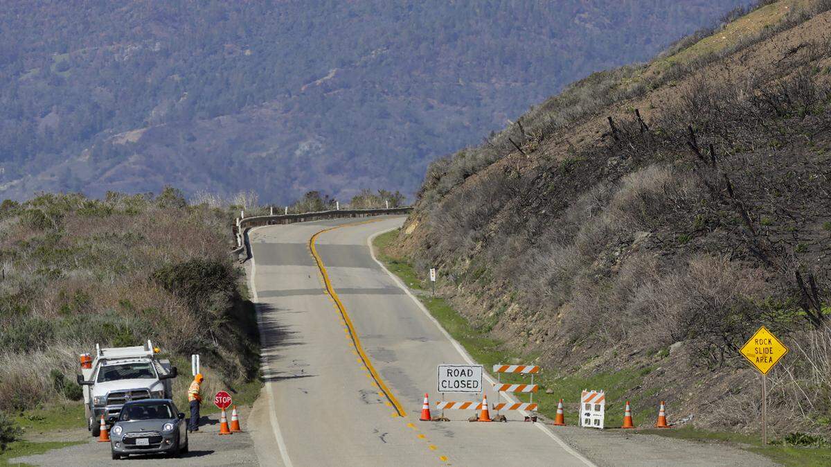 A Highway 1 closure and turnaround at the north end of Pacific Valley will move north to Big Creek Vista Point at PM 27.3 on Friday, Feb. 19, 2021. The road is closed due to a mudslide at Rat Creek. Damage from the 2020 Dolan Fire can be seen at right.