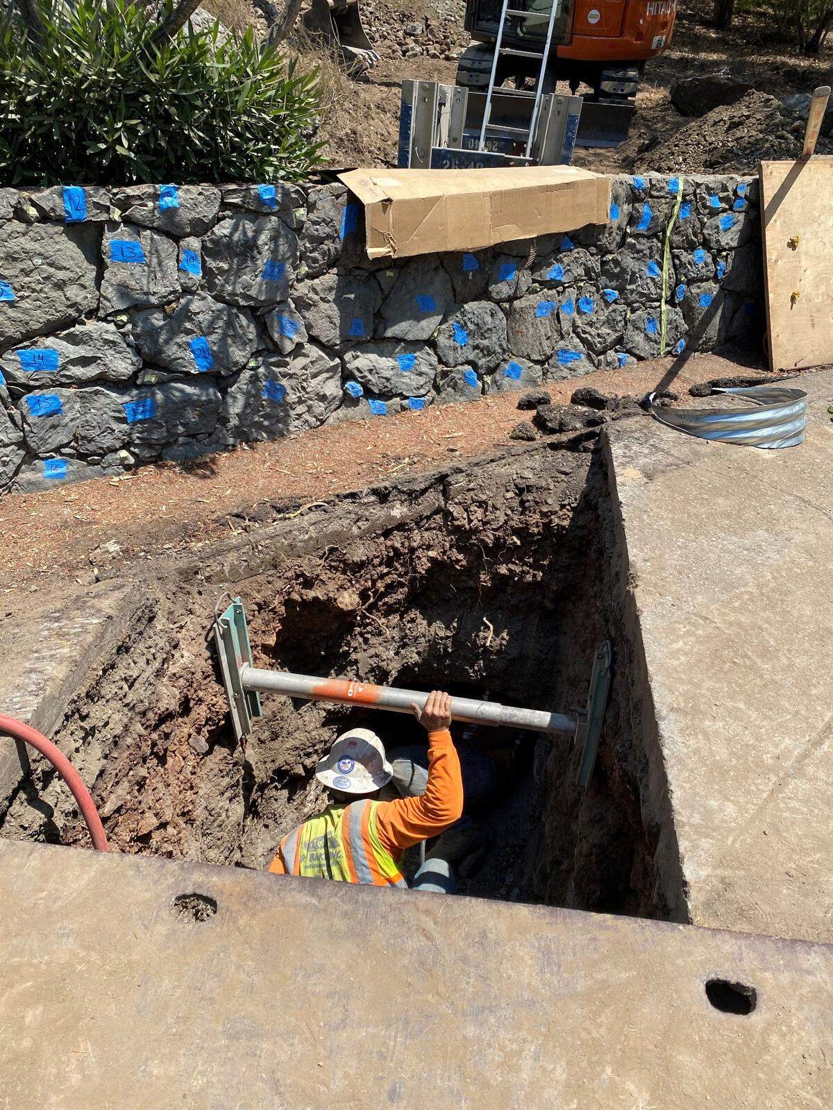 A road-crew member works in late November on a job to complete repairs on 27 damaged culverts under the historic access road leading to the Hearst Castle hilltop compound. However, another problem has been identified, one that likely will keep the Castle closed through the first quarter of 2022. That’s when castle officials and contractors had estimated the first job would be finished. The newly verified damage on the entire top 2.25 miles of the road will require a complete overhaul.