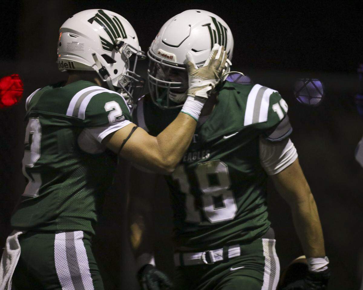 Luke Olsen, left, congratulates Nick Capaci on his touchdown. Templeton beat Morro Bay 56-14 in football game seen here on Oct. 9, 2025.