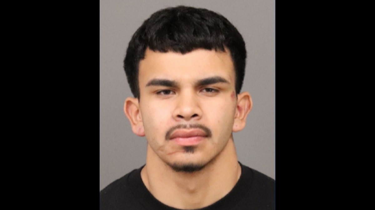 Carlos Luis Chavez, 20, is charged with attempted murder, residential burglary and illegally being in possession of a firearm.