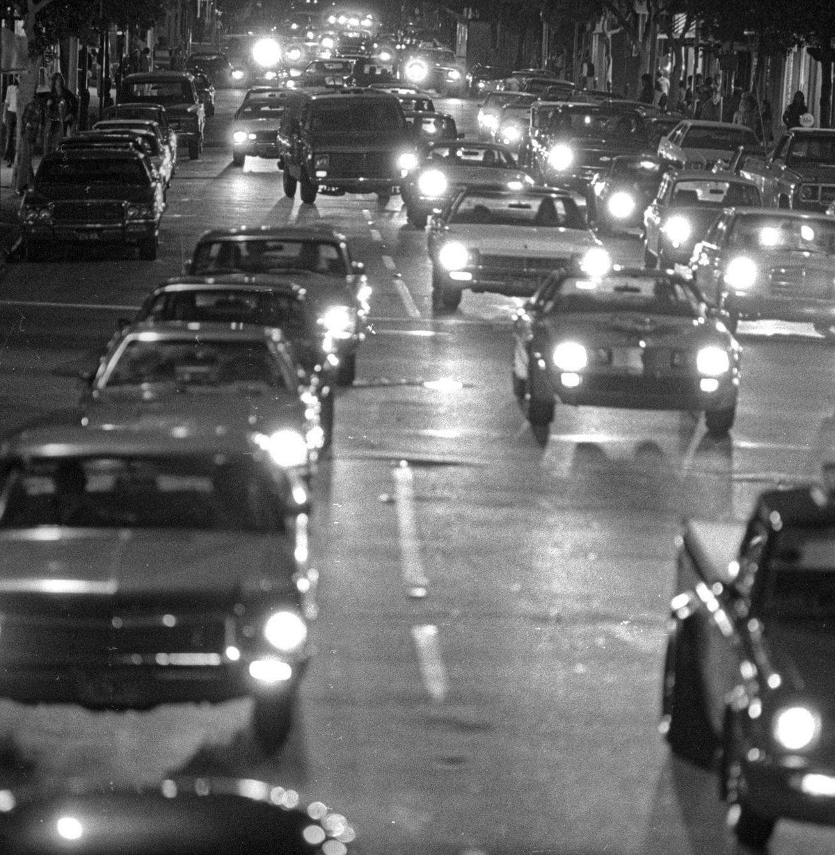 Cars stream down Higuera street the last cruise night in San Luis Obispo on July 3, 1980