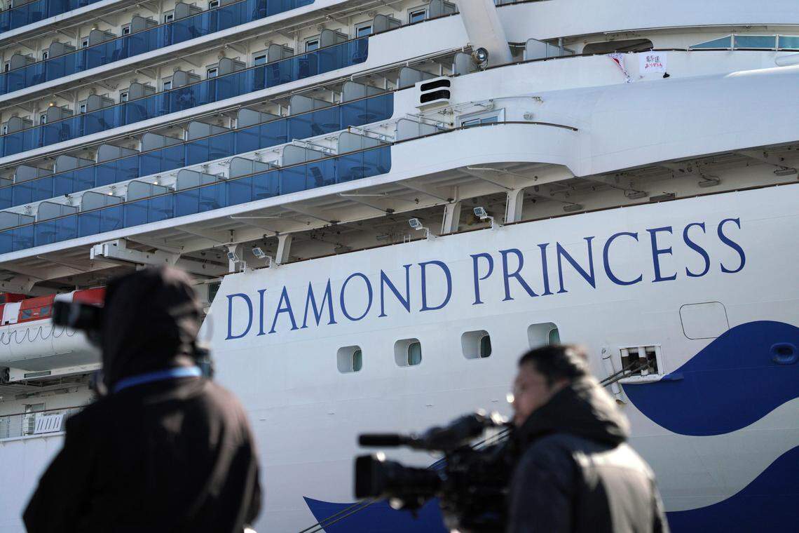 The quarantined cruise ship Diamond Princess is anchored in the Yokohama Port Sunday, Feb. 9, 2020. Japan on Saturday reported three more cases of the coronavirus aboard the Diamond Princess for a total of 64 . There are 3,700 passengers and crew on the Diamond Princess who must remain on board for 14 days. (AP Photo/Eugene Hoshiko)