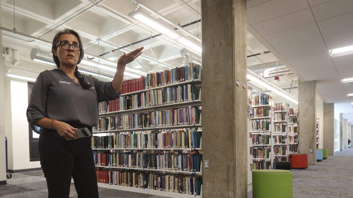 Carla Brown, Cal Poly facilities program manager leads tour. Cal Poly had a tour of the nearly $80 million renovation of the Robert E. Kennedy Library on Sept. 9, 2025. Energy efficient windows and LED lights will help cut costs, while a new climate control system will keep the temperature comfortable.