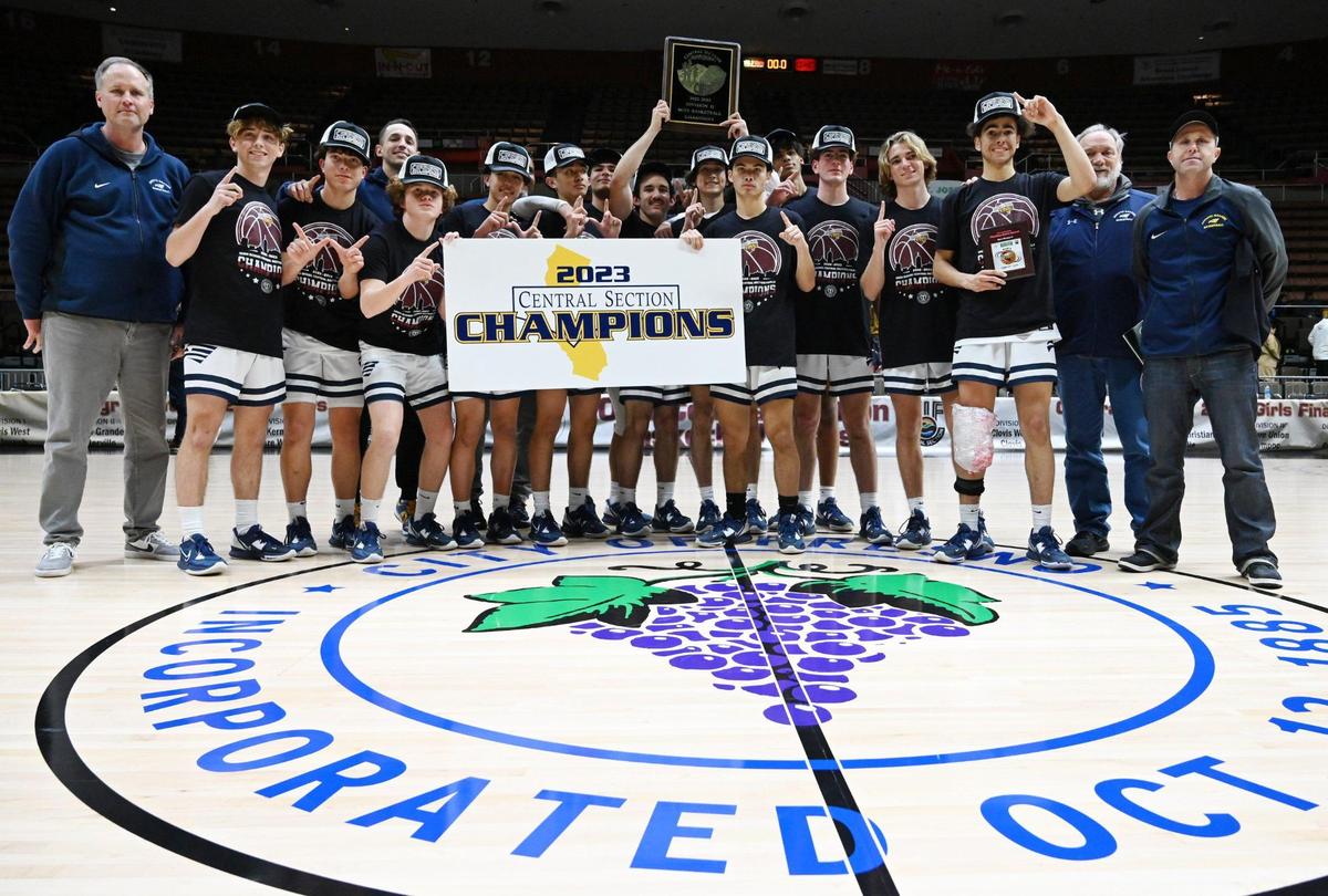 Arroyo Grande poses for a photo after its 59-30 win over Porterville at the CIF Central Section boys Division 2 basketball championship Friday, Feb. 24, 2023, in Fresno.