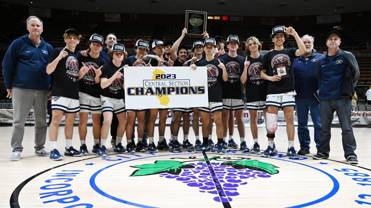 Arroyo Grande poses for a photo after its 59-30 win over Porterville at the CIF Central Section boys Division 2 basketball championship Friday, Feb. 24, 2023, in Fresno.