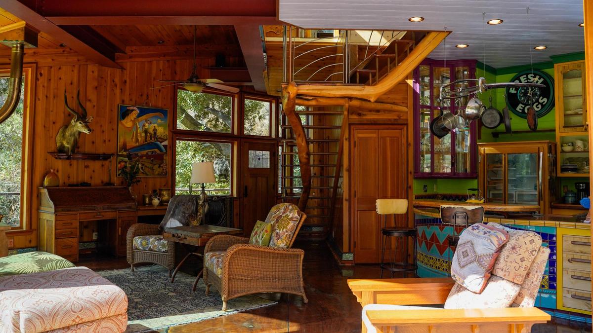Longtime former San Luis Obispo County resident Reggie Whibley’s home north of Lopez Lake is a treehouse-like structure built on metal legs painted to resemble trees Tuesday, Oct. 29, 2024. Following Whibley’s death in 2020, the property went up for sale, featuring views of the surrounding canyon, custom woodworking and design and a fully converted Beachcraft airplane parked in the backyard, which serves as the guest lodging.