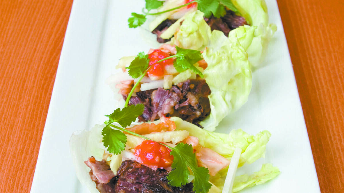 The Korean braised short ribs known as “kalbi” are available either as appetizer or entrée.