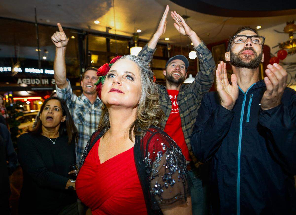 San Luis Obispo Mayor Heidi Harmon watches as the early returns come in during her election night party on Tuesday, Nov. 6, at Kreuzberg Cafe in San Luis Obispo. Harmon wound up winning a second term.