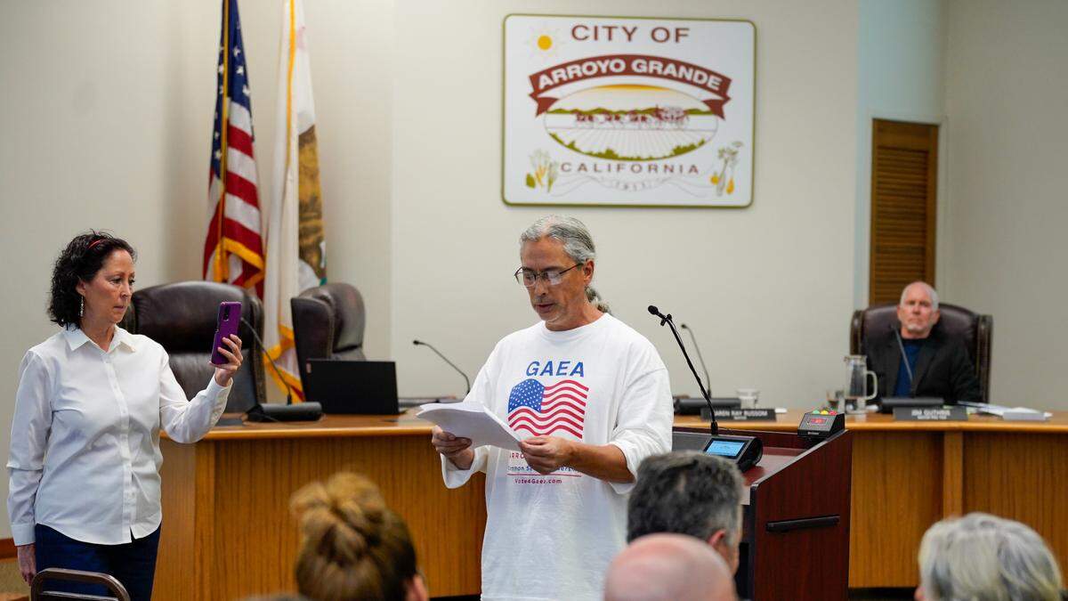 Arroyo Grande mayoral candidate Gaea Powell records a speech by one of her supporters at a City Council meeting on Aug. 27, 2024. Multiple commenters said they were frustrated with the City Council’s decision to limit general public comment from three minutes to one minute.