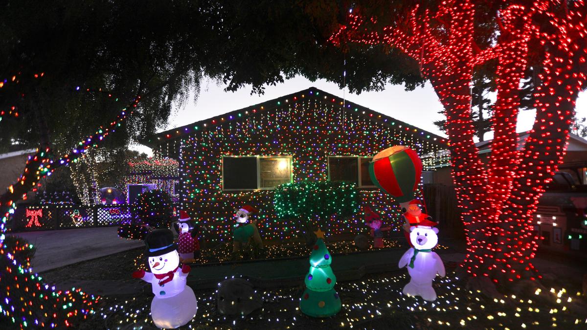 This display at 1619 Pereira Dive near Madonna Road has a mini golf course in addition to lights.