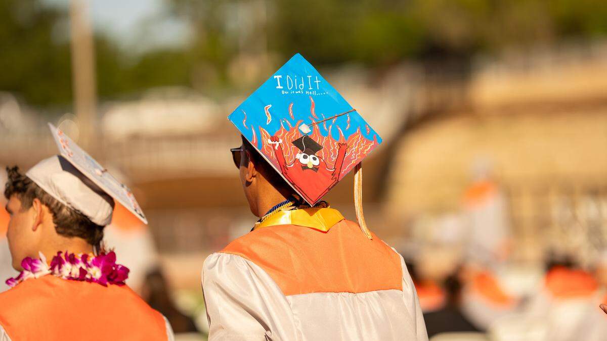 An Atascadero High School student's graduation cap features the flaming Elmo meme at commencement ceremonies on Wednesday, June 3, 2026. 296 seniors walked the stage and received their diplomas.