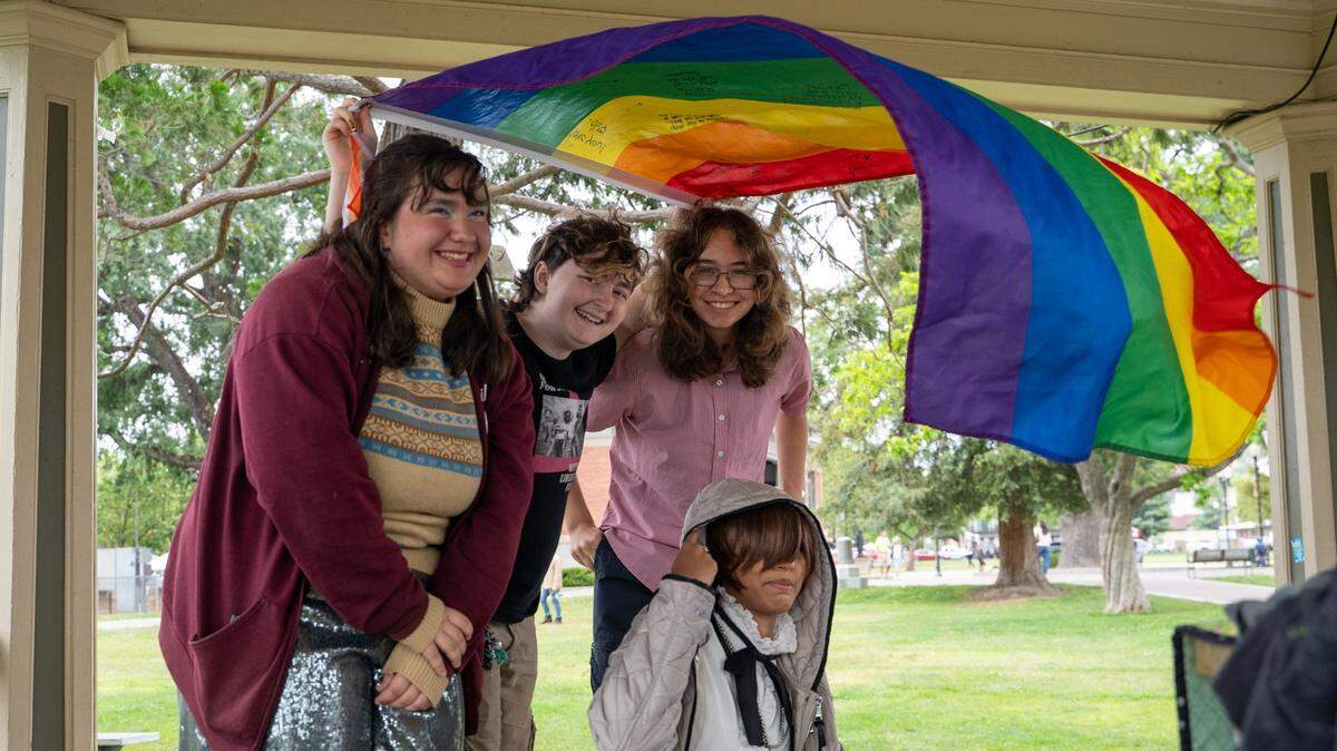 Paso Robles High School Queer Student Union members Bailey Andrews, Aster Watson, Clarae and Olivia hold a clothing swap event at Downtown City Park in Paso Robles on Saturday, May 2, 2026. The Queer Student Union offers community to LGBTQ+ students through after-school events such as a clothing swap held in the park.