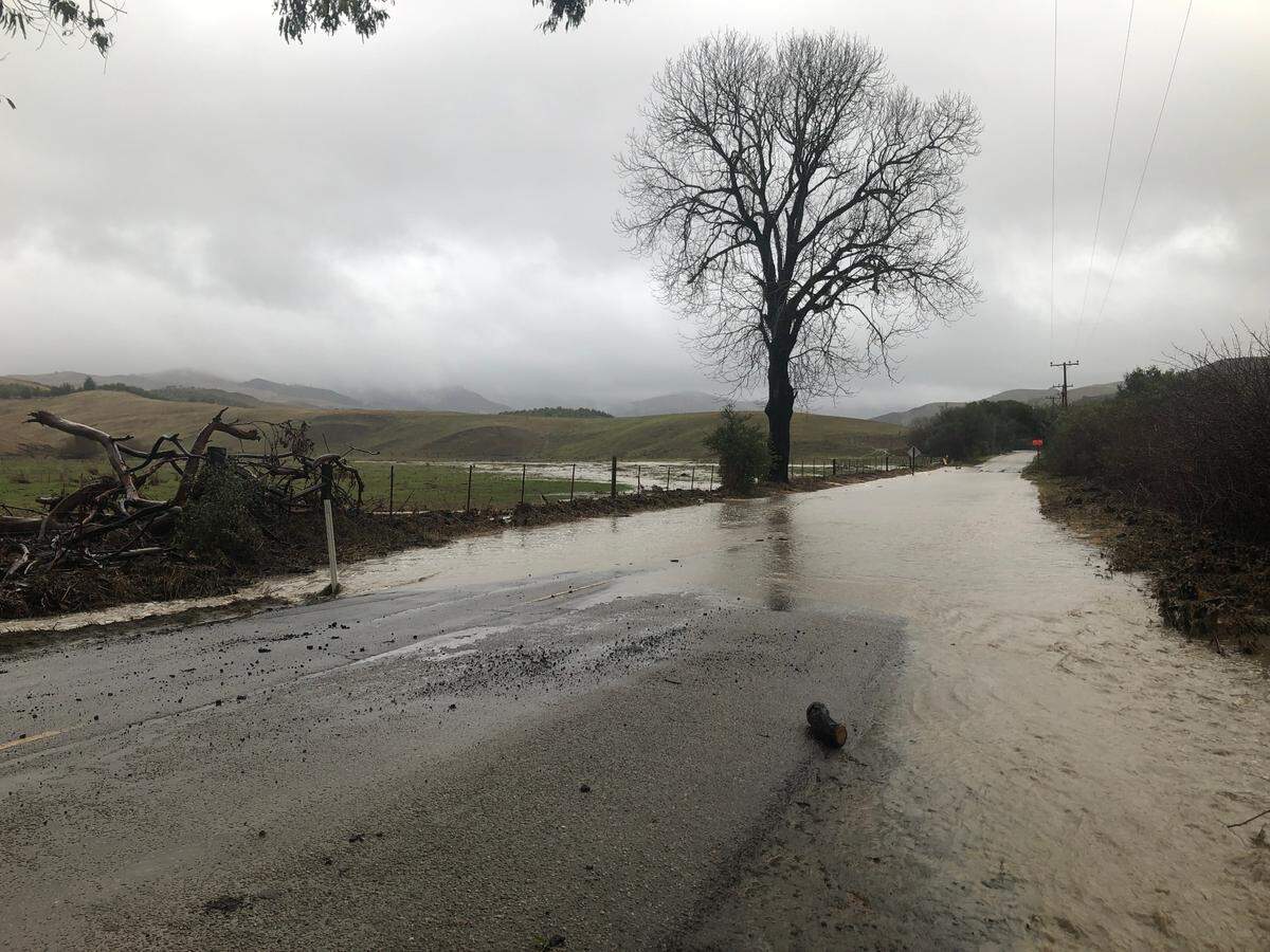 Santa Rosa Creek Road is flooded just past the Coast Union High School in Cambria on Thursday afternoon.