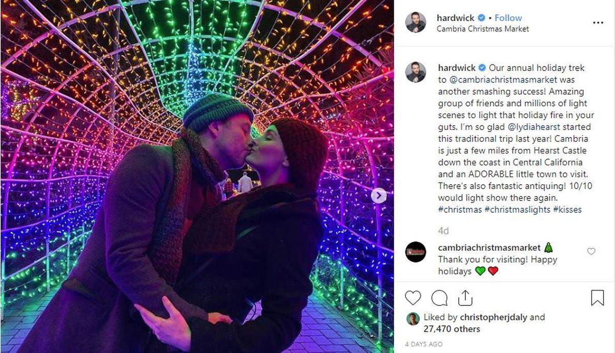 “Talking Dead” host Chris Hardwick shared this photo of himself kissing wife Lydia Hearst at the Cambria Christmas Market via Instagram.