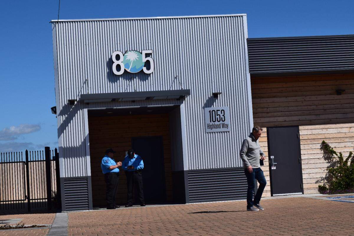 A man leaves 805 Beach Breaks on Thursday morning after being told the business is closed. Law enforcement descended on the cannabis shop in Grover Beach on Thursday morning.