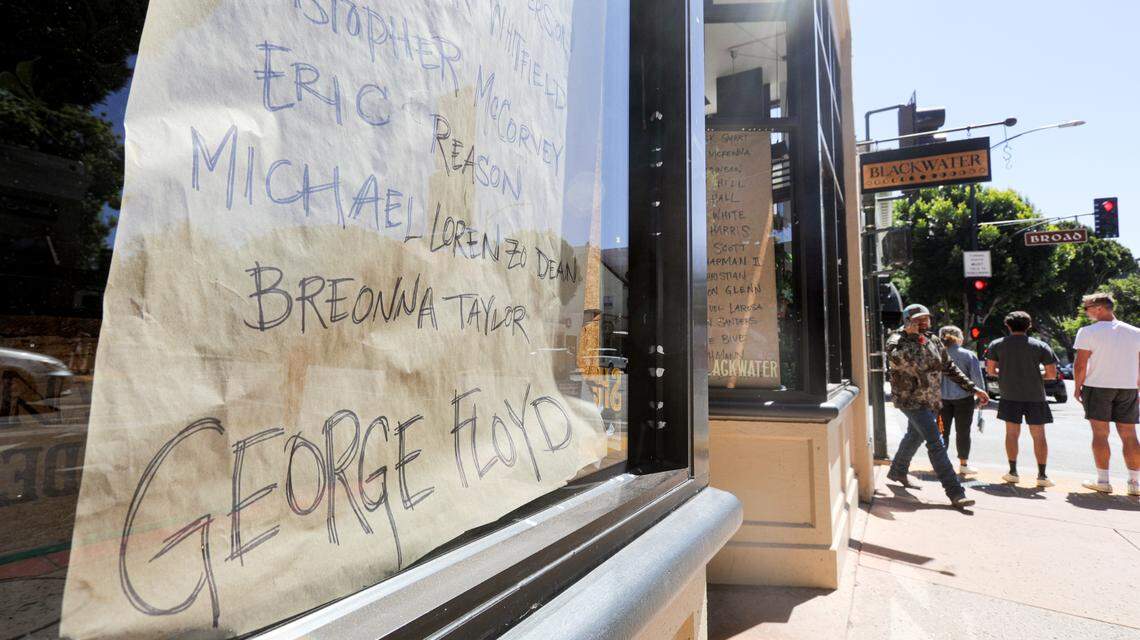 Several businesses boarded up in downtown San Luis Obispo in early June. After one day of blank paper in the windows of Blackwater on Higuera Street, owners Erica Hamilton and her mother, Maryalice Hamilton, decided they needed to make a statement of support, listing names of victims of violence.