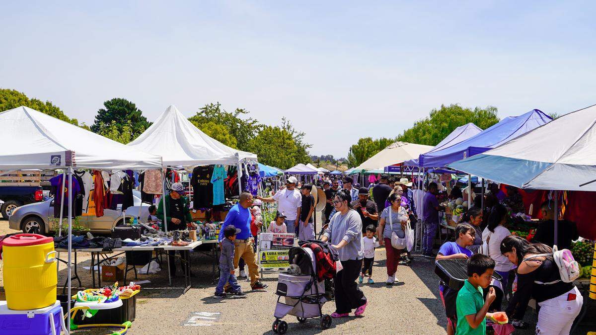 Customers walk through the Nipomo Swap Meet's aisles of vendors on Sunday, Aug. 10, 2025. The Swap Meet features more than 300 vendors, the largest market of its kind on the Central Coast.