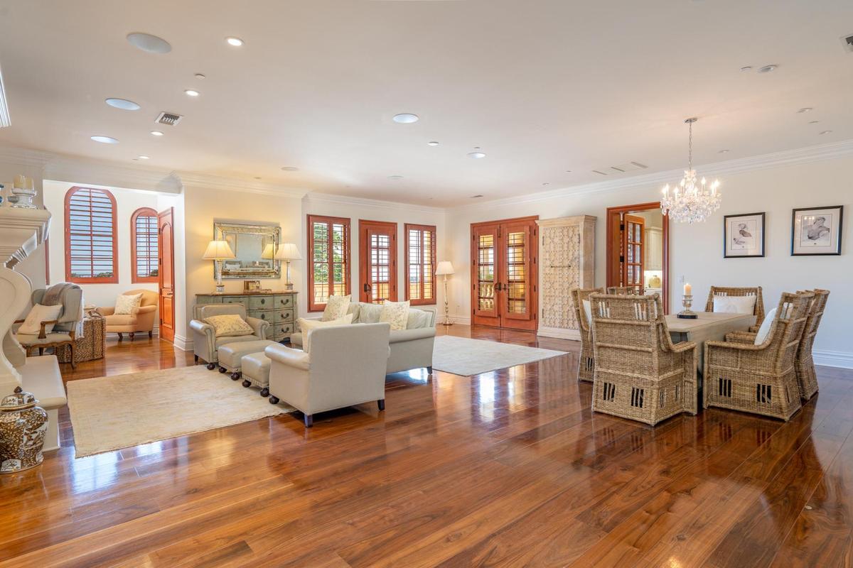 The living room of one of the two 3,700-square-foot villas at Villa San-Juliette. The property owned by “American Idol” producers Ken Warwick and Nigel Lythgoe will go up for auction on May 17, 2025.