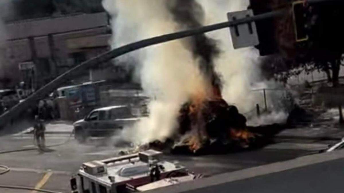 The trailer of a truck towing 48 hay bales caught fire in Atascadero on the afternoon of Oct. 26, 2024.