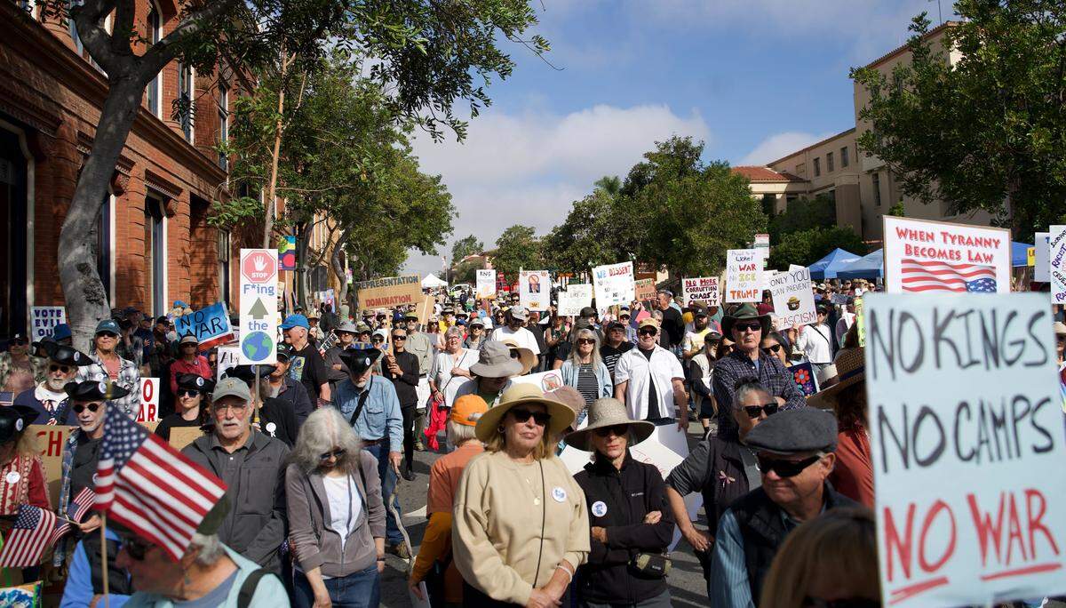 Residents across SLO County rallied downtown at the San Luis Obispo Superior Courthouse for a No Kings protest featuring speakers, music and community groups on March 28, 2026.