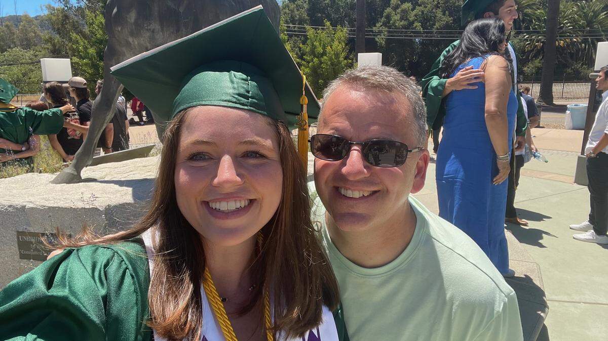 Lauren Tarica — aka Little Miss Cal Poly Grad — takes a selfie with Joe Tarica after her graduation on June 12, 2022.