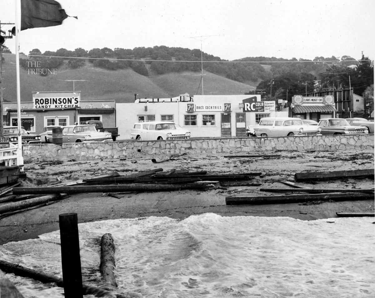 STORM DEBRIS ...The worst storm in many years struck with fury at Avila beach Feb 9, 1960. The beach along Front street was littered with lumber and pilings and at one point waves were breaking at the seawall.