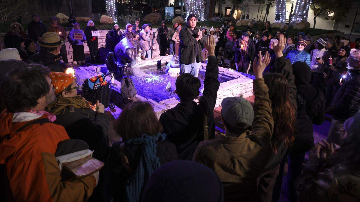Cesar Vasquez recognised volunteers with 805 UndocuFund and said about 10 people a day are being taken in the region from Ventura to San Miguel. About 200 people gathered in Mission Plaza on Jan. 8, 2026 to protest recent detentions or arrests of 1,400 people by ICE and nationally the recent shootings by federal agencies. 