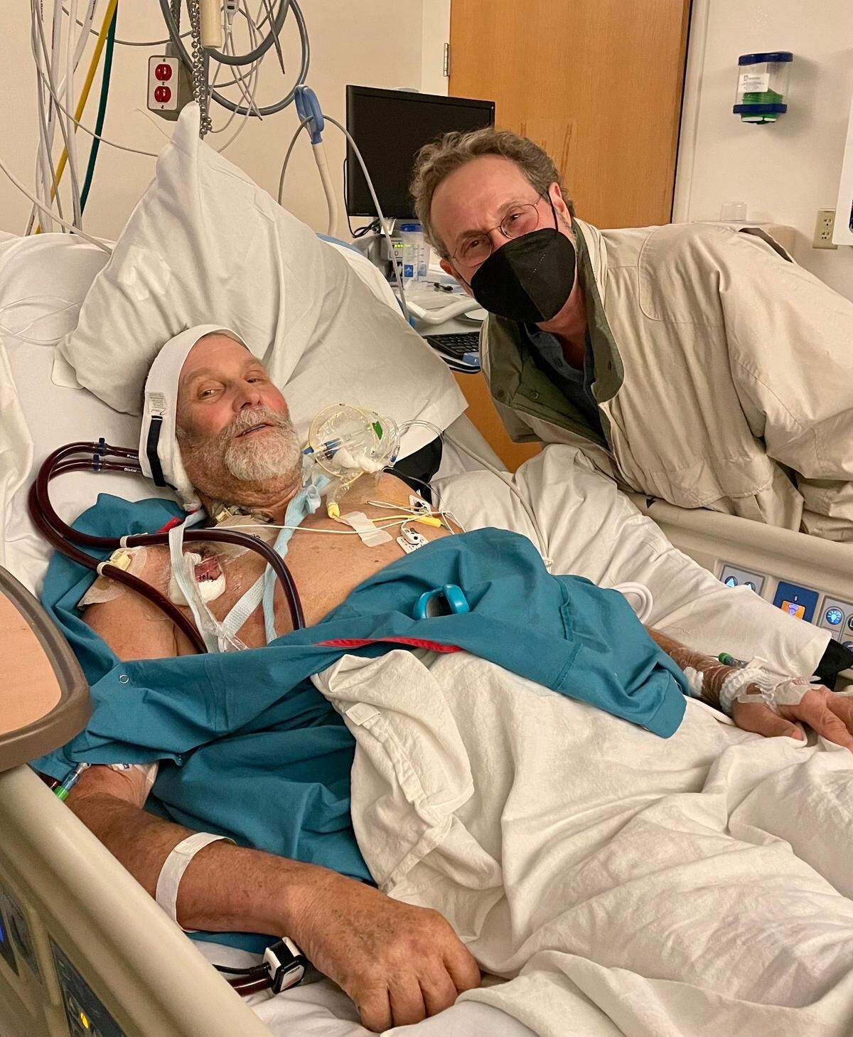 Steve Ulrich, (left) recovers in Providence St. Vincent Medical Center from a heart transplant surgery with “Rubes” author and Nipomo resident Leigh Rubin (right) Dec. 8, 2022. Rubin acted as his lifelong friend’s caretaker through his three-month recovery process.