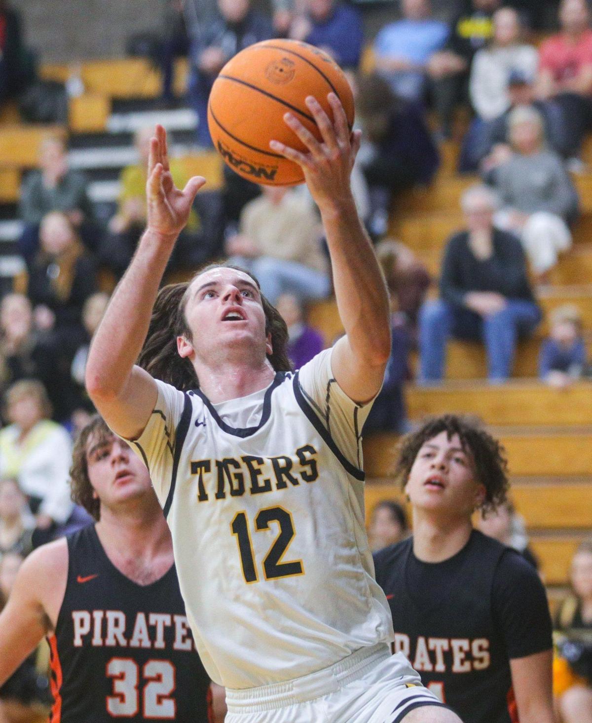 Cy Isaacs goes to the hoop in San Luis Obispo’s 63-51 win over Santa Ynez in a boy’s basketball game on Jan. 20, 2023.