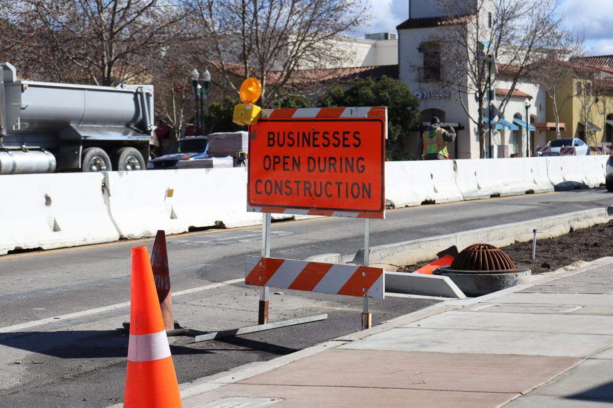 Downtown Atascadero businesses remained open during construction on El Camino Real, as indicated by signs lining the main drag on Jan. 27, 2025. Construction began in June 2024 and will last until the summer of 2025.