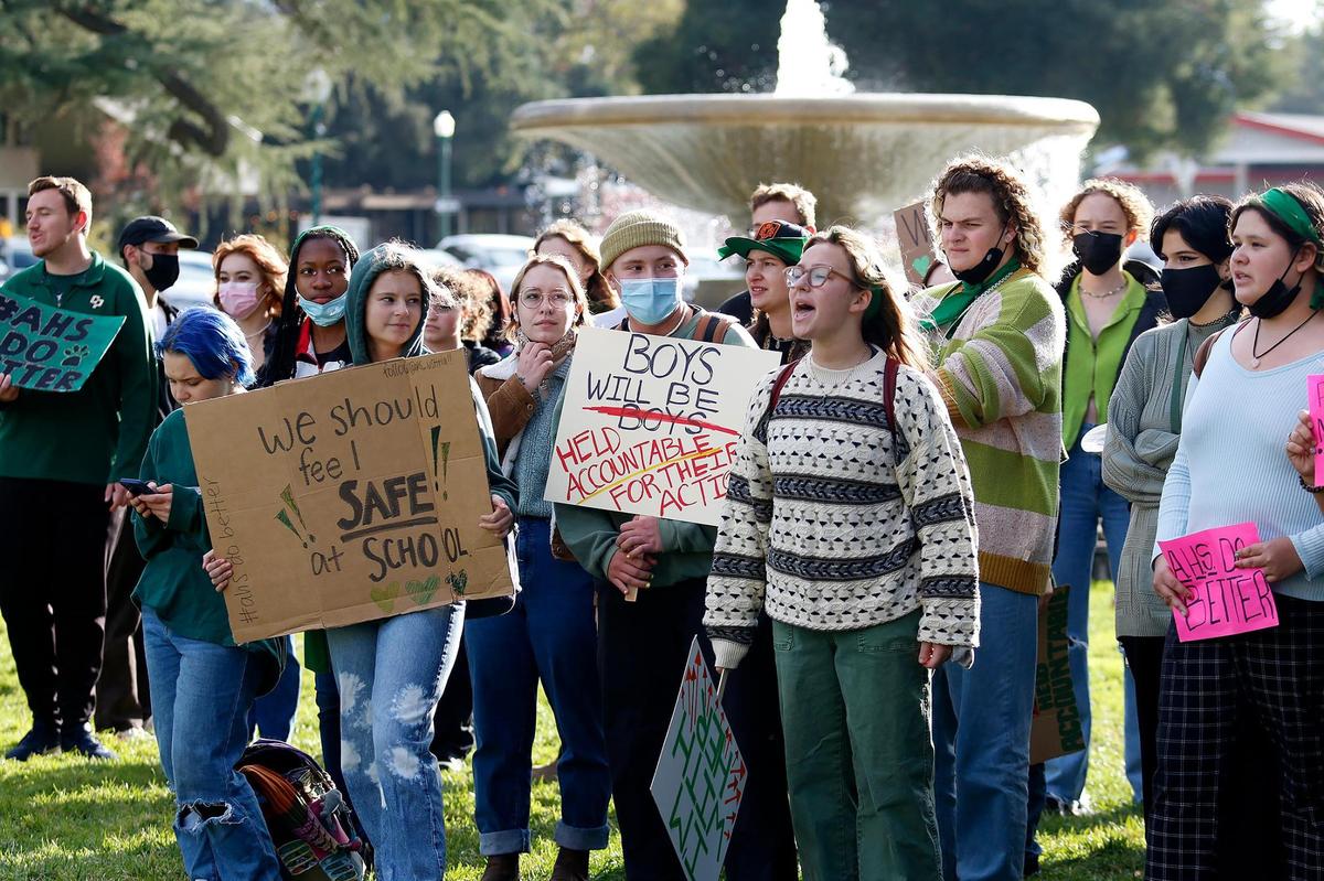 About 100 Atascadero High School students, alumni and parents walked to City Hall on Friday to protest incidents of sexual harassment, racism and homophobia revealed in anonymous stories on a new Instagram account.