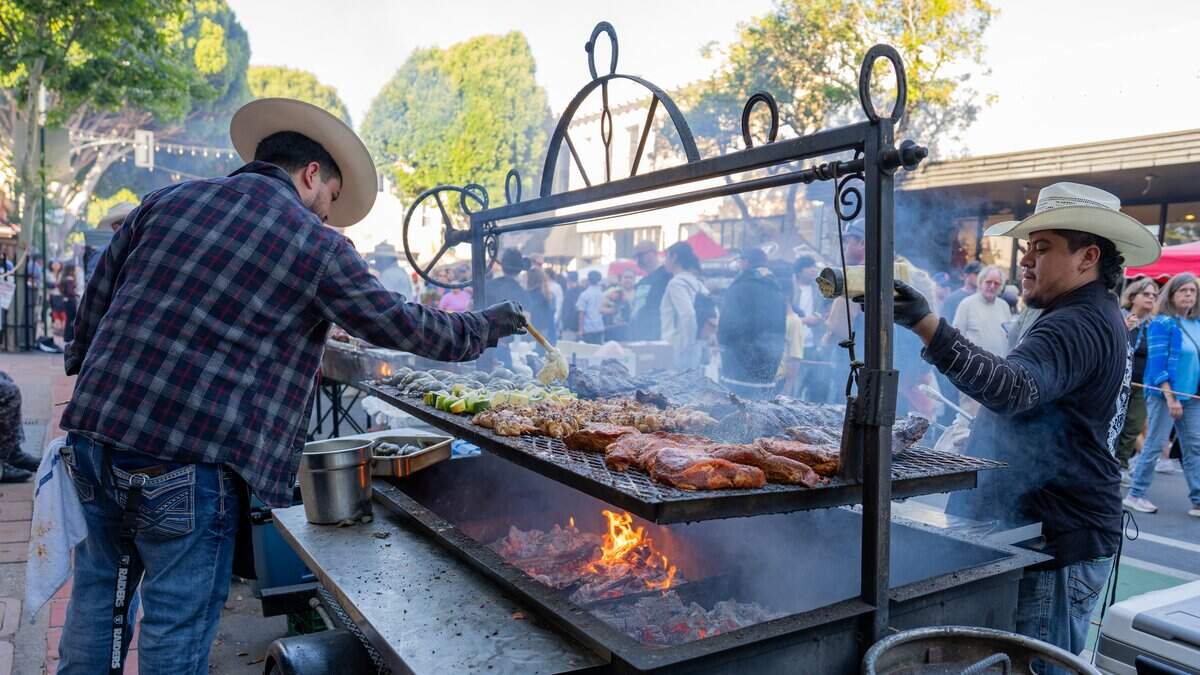 Tri-tip, chicken drumsticks, artichokes and vegetable kebabs are seasoned and grilled at Vix Creek Saloon’s booth at the Downtown SLO Farmers Market on June 25, 2025. Victor Albarran, a former F. McLintocks employee, opened his restaurant in the former McLintocks location in Arroyo Grande and now occupies McLintocks former space at the market.