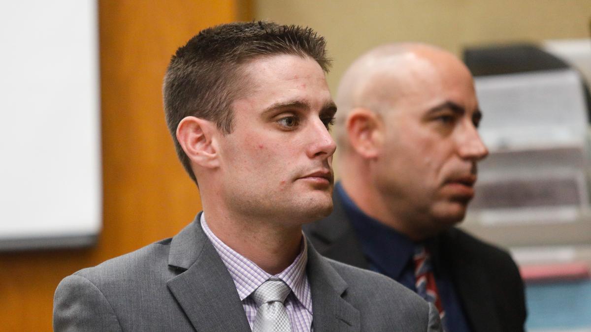 Former Grover Beach police Officer Alex Geiger, in foreground stands as jury exits. Geiger is charged with failing to maintain control of a dangerous animal and involuntary manslaughter when his former police dog “Neo” escaped the yard and attacked neighbors resulting in one person’s death and serious injuries to another. David Middlecamp 4-8-2019