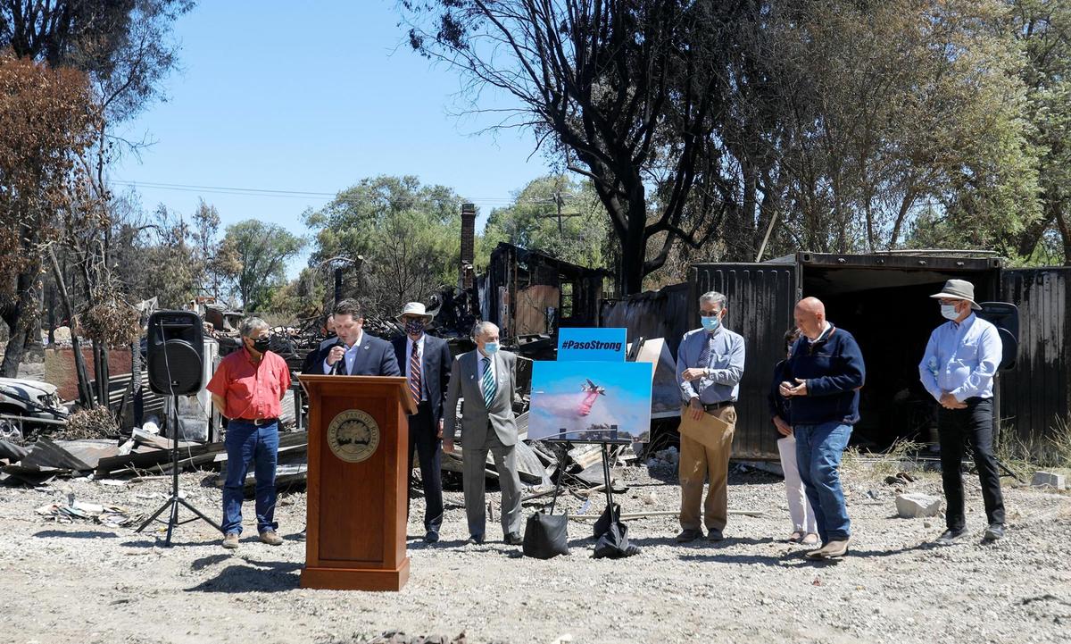 Assemblyman Jordan Cunningham, Mayor Steve Martin, Supervisor John Peschong and other local leaders held a news conference Thursday at the location of a home that was destroyed Monday in the River Fire. Officials say the Central Coast Regional Water Board has blocked them from being able to clear brush in the riverbed.