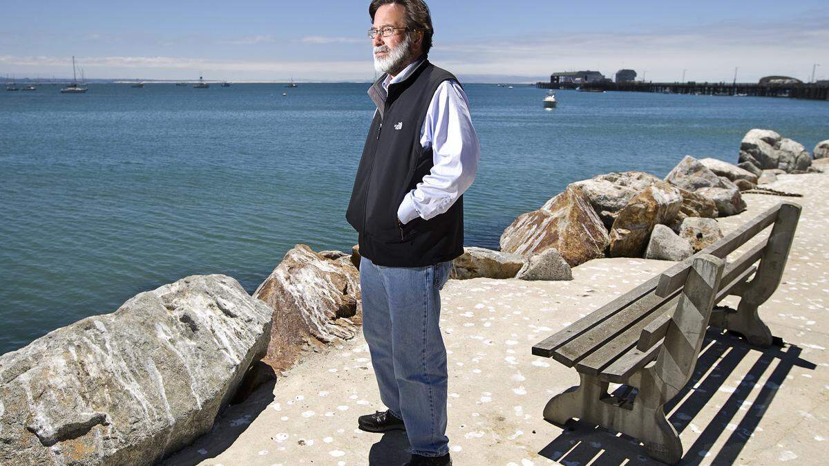 Richard Martinez, father of Christopher Michaels-Martinez, who was killed in the violent rampage near UCSB in May, looks out across the water at Port San Luis, a place he and his son loved to visit together.