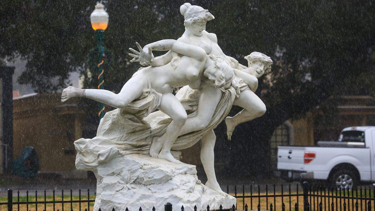 The “Wrestling Bacchantes” don’t mind the rain at the Sunken Gardens in Atascadero on Dec. 27, 2021. The statue created by Italian artist Aristide Petrilli was exhibited at the 1904 World’s Fair in St. Louis and brought to the city by founder E.G. Lewis in 1916. The sculpture was restored in 2013.
