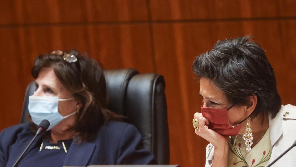Supervisors Debbie Arnold, left, and Dawn Ortiz-Legg listen to public comment. The San Luis Obispo County Board of Supervisors listened to public comment before formally adopting a controversial new redistricting map on Dec. 14, 2021.