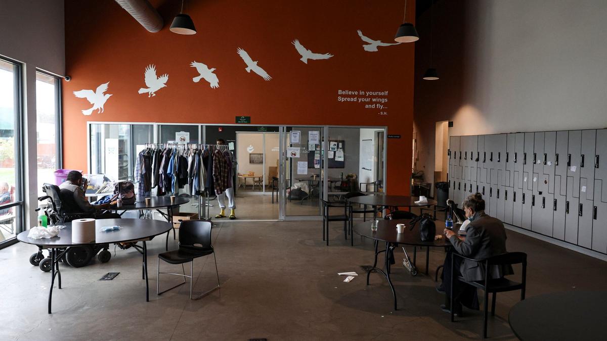 The common room at 40 Prado homeless services center in San Luis Obispo has locker space and a rack of donated clothing as seen Jan. 4, 2023.