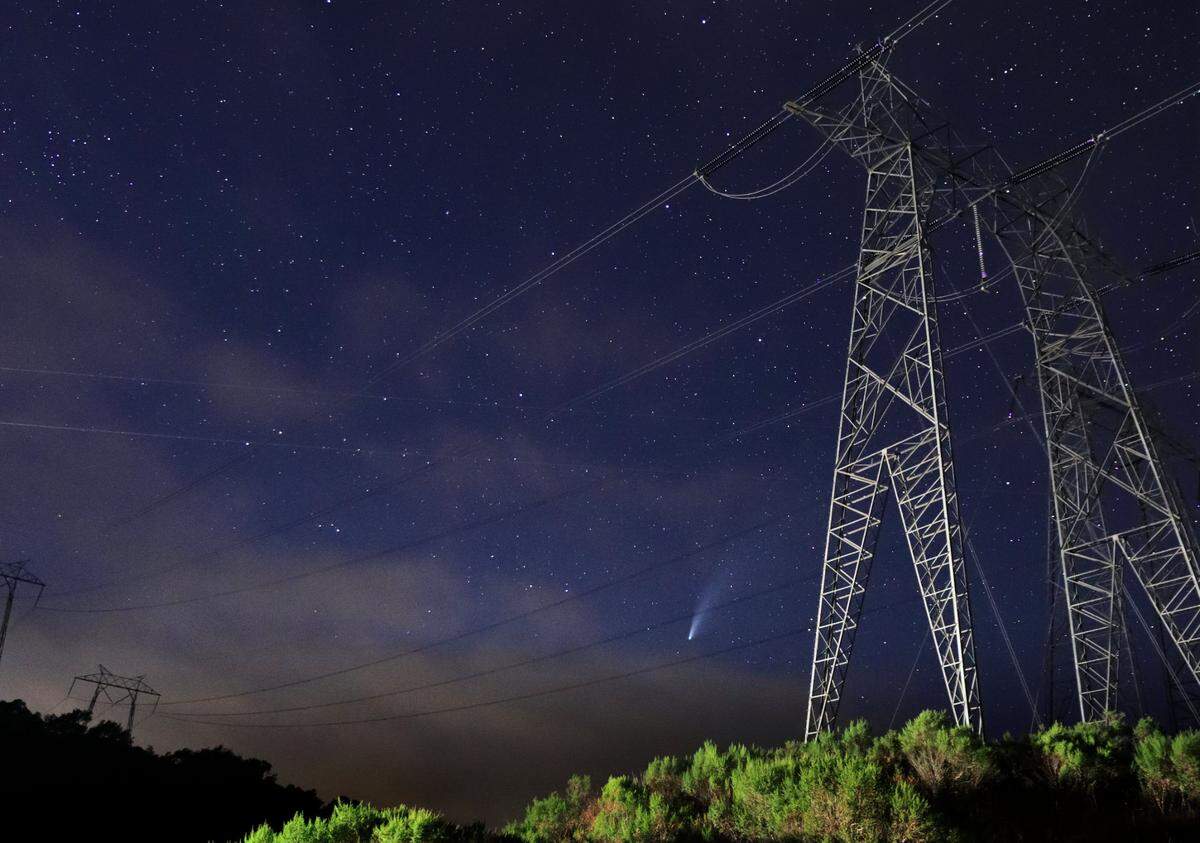 Arroyo Grande photographer Vivian Krug Cotton took this photo of the NEOWISE comet in the sky behind high-voltage towers on July 20, 2020.