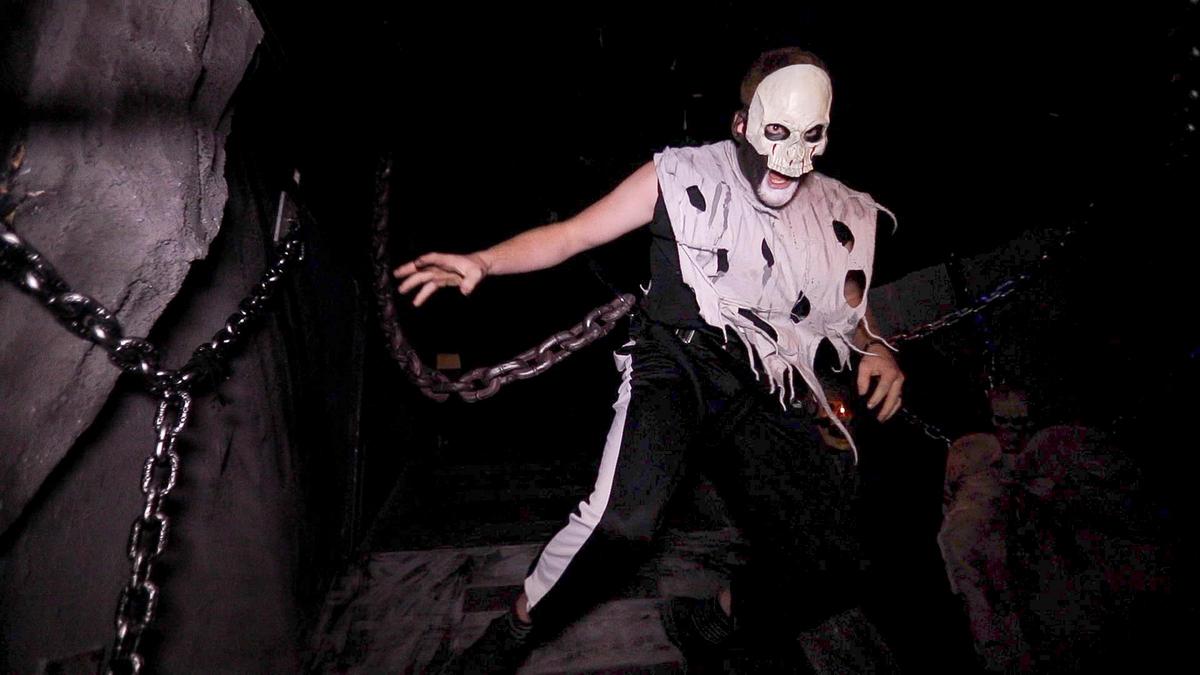 The Tribune reporters, John Lynch and Stephanie Zappelli, brave the The Haunt in Atascadero and Nightmare on Main Street in Paso Robles, Oct. Friday, 13, 2023. This scary creature jumps out at you.