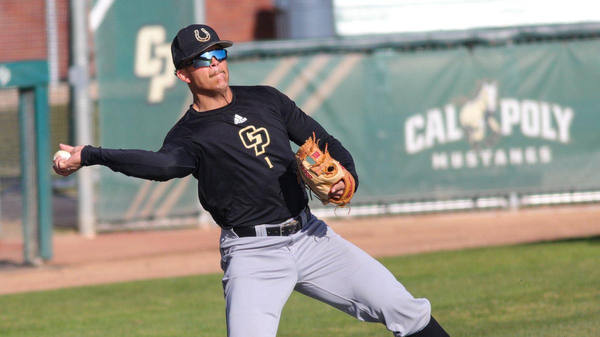 Taison Corio fields a grounder as the Cal Poly baseball team practices on Feb. 14, 2023, before opening the baseball season against Missouri State.
