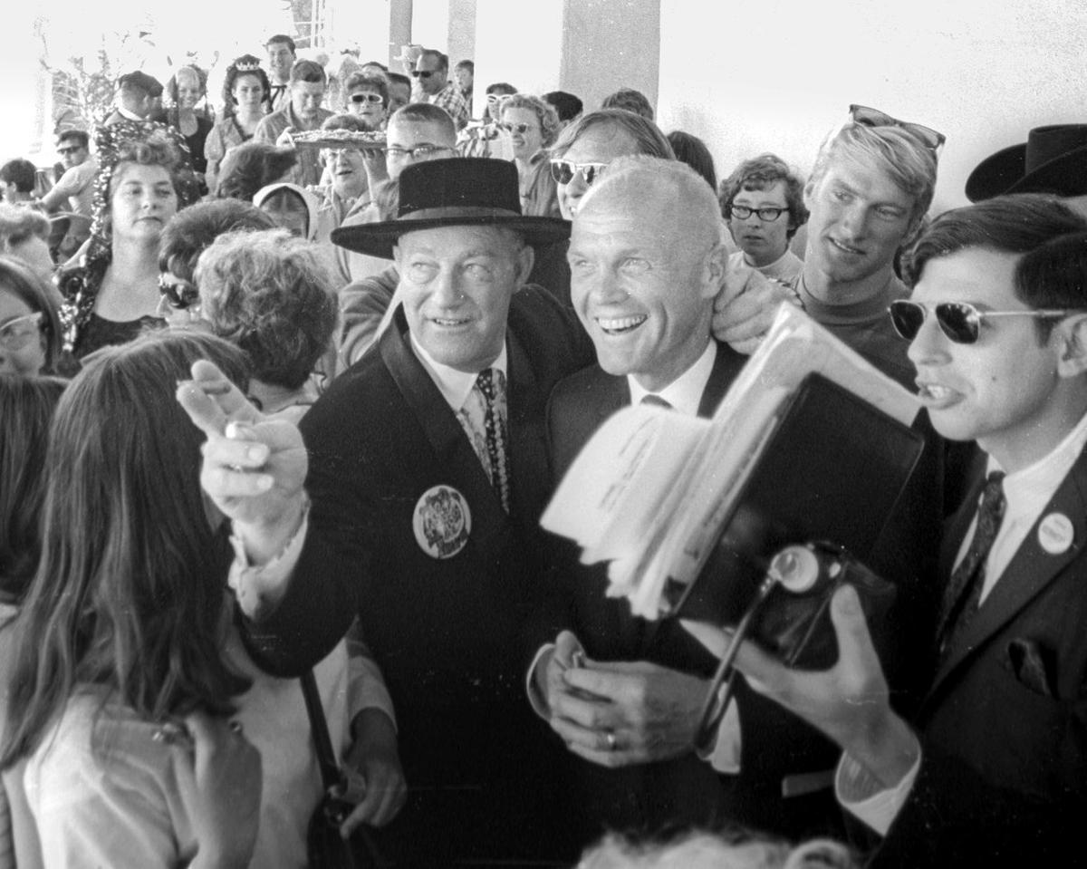 Mayor John Glenn visited San Luis Obispo May 18, 1968 during La Fiesta. He is seen here with La Fiesta El Presidente Edward Davin (in hat) spoke from the side of the Old Mission to a crowd on Monterey Street as Robert F. Kennedy, Sr. ran for the Democratic presidential nomination.