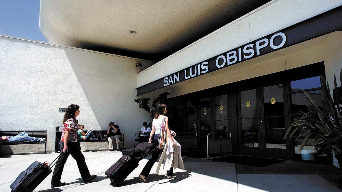 Travelers enter the terminal at the San Luis Obispo County Regional Airport.