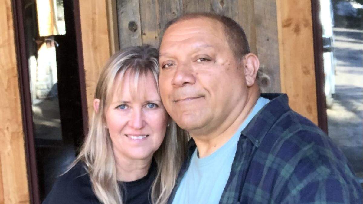 Pacific Hair Salon owners Ingrid and Andrew Turrey pose for a photo. The couple’s Cambria home flooded after part of the roof lifted off during a storm.