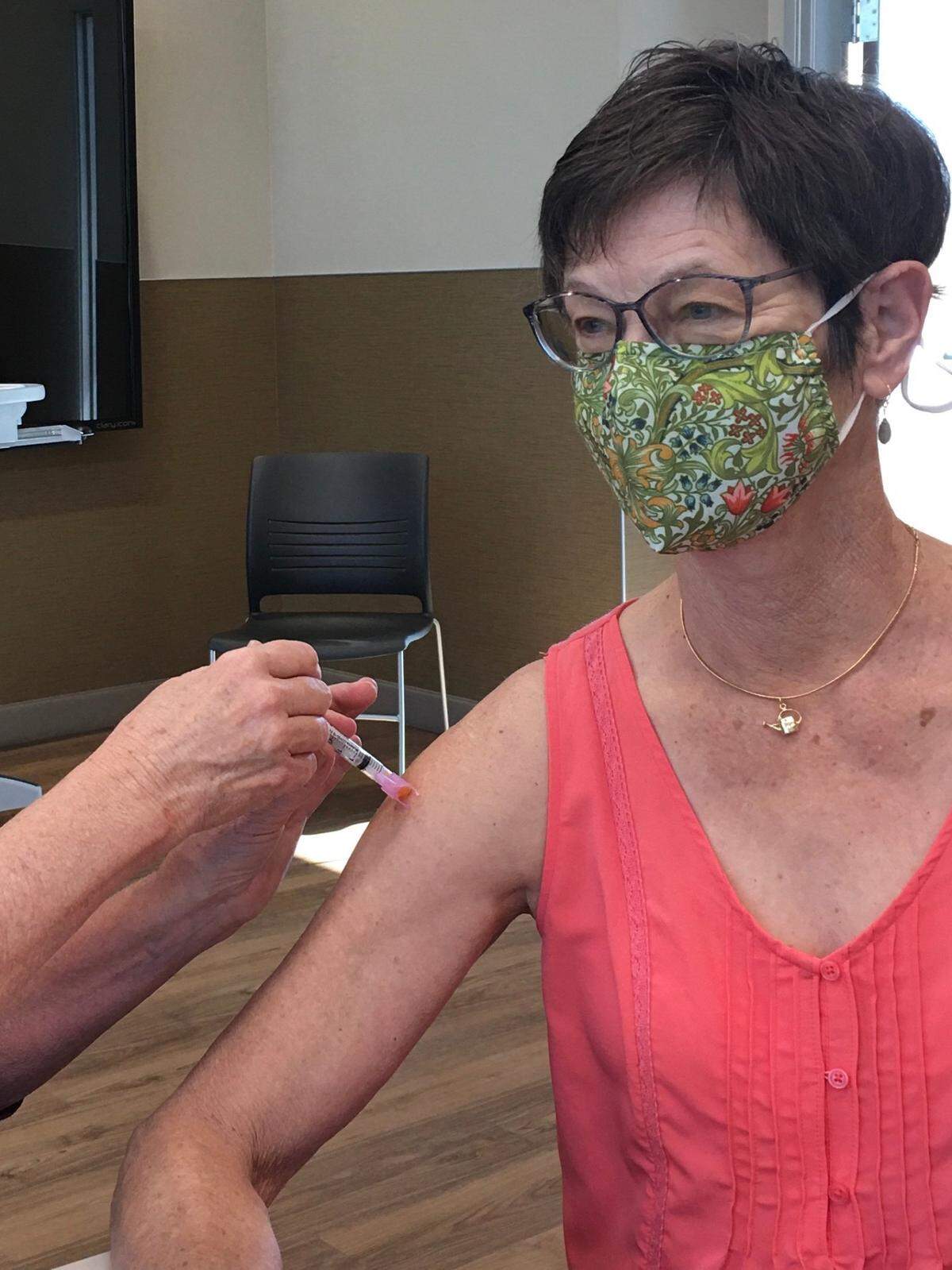Retired San Luis Obispo therapist Linda Lewis Griffith receives the coronavirus vaccine.