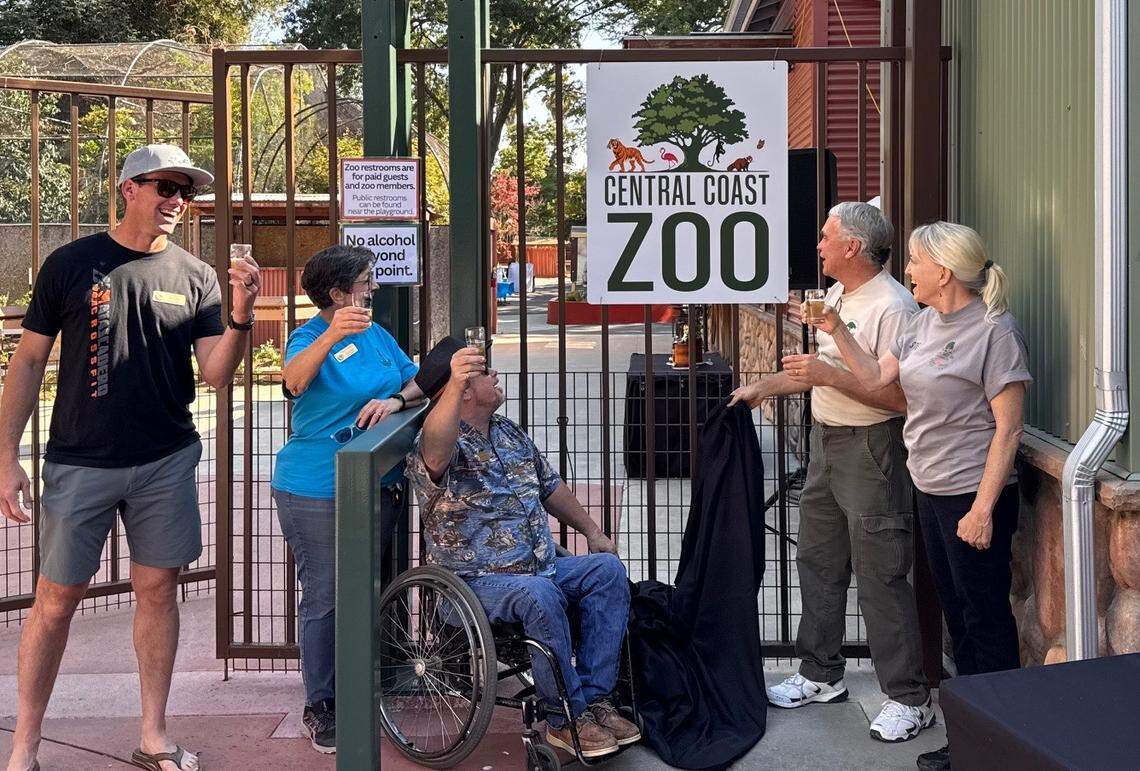 Atascadero City Council members celebrate the unveiling of the zoo’s new name: The Central Coast Zoo.