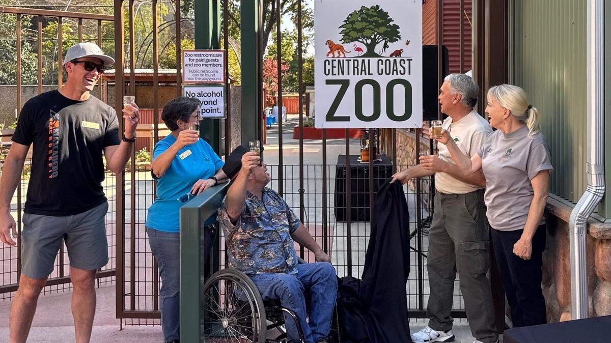 Atascadero City Council members celebrate the unveiling of the zoo’s new name: The Central Coast Zoo.