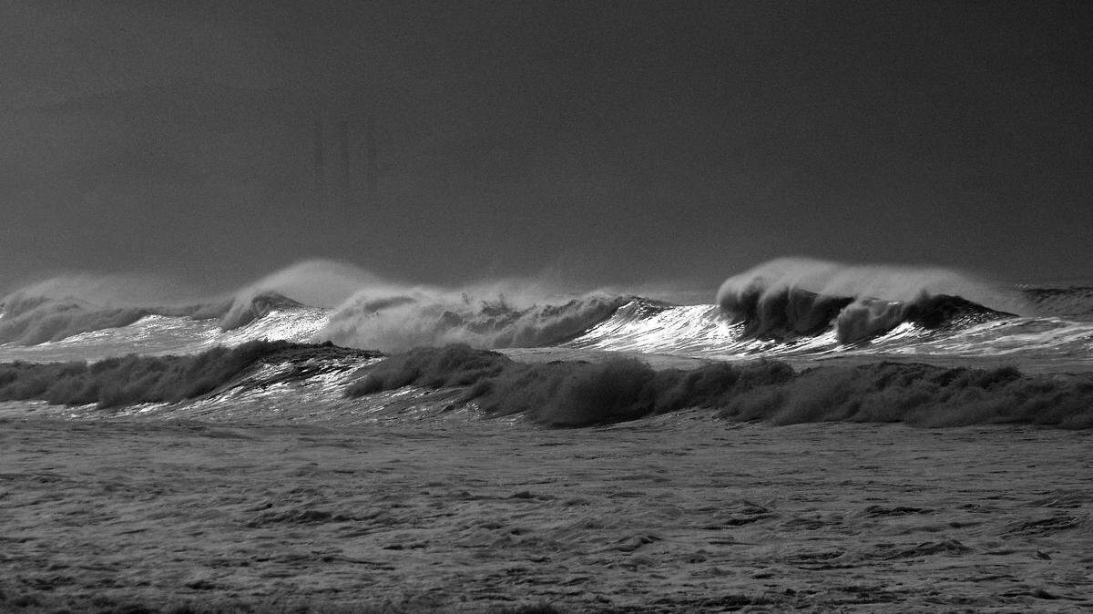 Waves breaking off the Point San Luis Lighthouse.