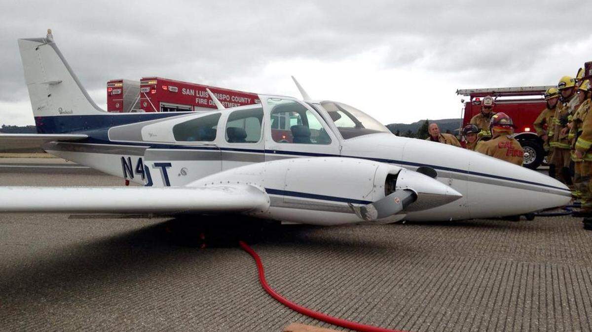 A twin-engine airplane landed hard and became disabled Wednesday, July 16, 2014, leading to a brief runway closure at San Luis Obispo County Regional Airport.